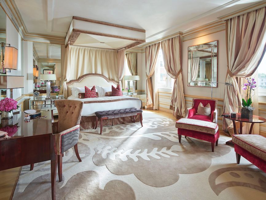 Imperial Executive Suite Bedroom enhanced with warm colours pieces of furniture
